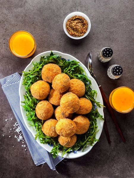 Italian snack. Fried balls from rice Arancini with mushrooms, ch — Stock Photo, Image