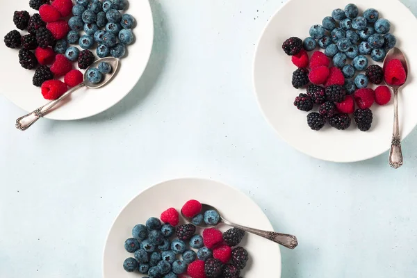 Fruit salad with Various fresh summer berries in white plate . T — Stock Photo, Image