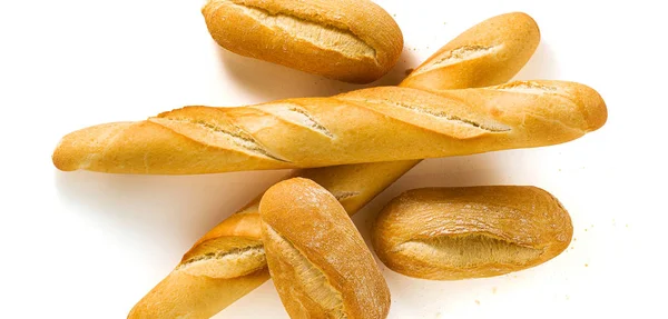 Banderoll av färskt vitt bröd baguette och bulle isolerad på en vit — Stockfoto