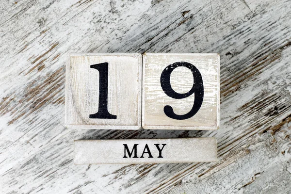 wooden calendar with date may, 19
