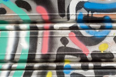 close up view of graffiti painted on the wall