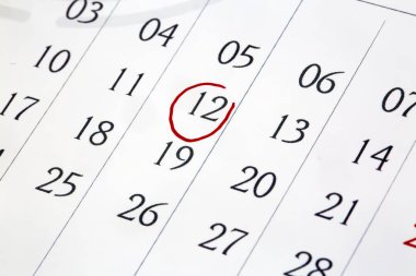 calendar planner with circled number 12