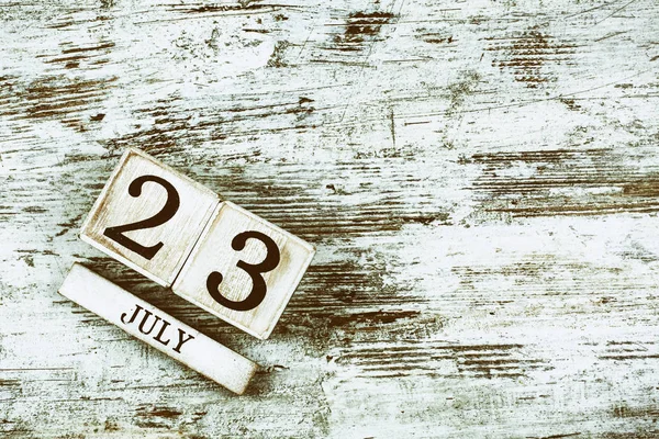 日期为7月23日的木制日历 — 图库照片