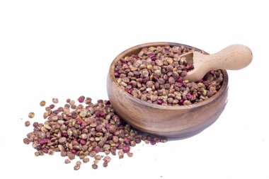 dry mixed peppers on white background