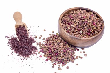 dry mixed peppers on white background