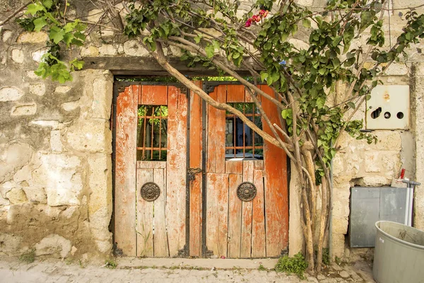 old wooden door of the house in the village