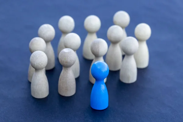 miniature people figures, leader and teamwork concept