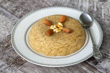 porriage with nuts on white plate