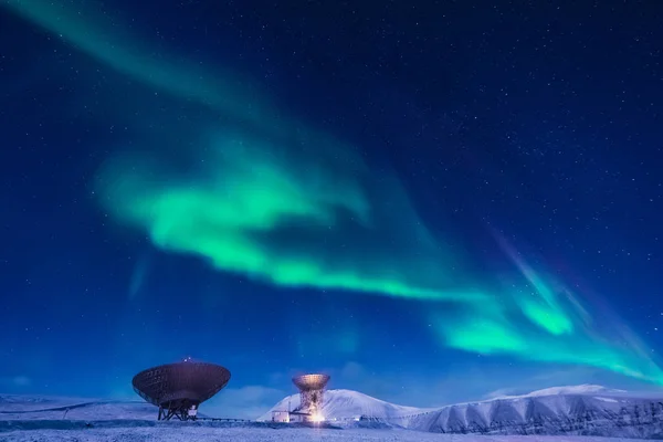 The polar arctic Northern lights aurora borealis sky star in Norway Svalbard in Longyearbyen the moon mountains — Stock Photo, Image