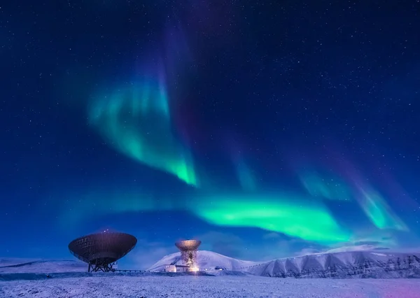 The polar arctic Northern lights aurora borealis sky star in Norway Svalbard in Longyearbyen the moon mountains — Stock Photo, Image