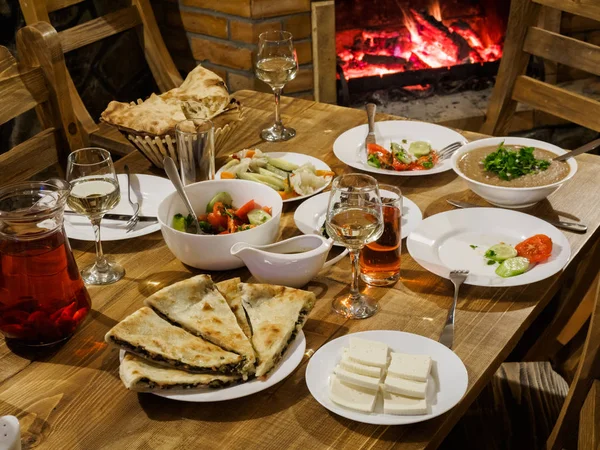 Georgian Dinner Table Fireplace Background Table Traditional Food Pies Salad — Stock Photo, Image