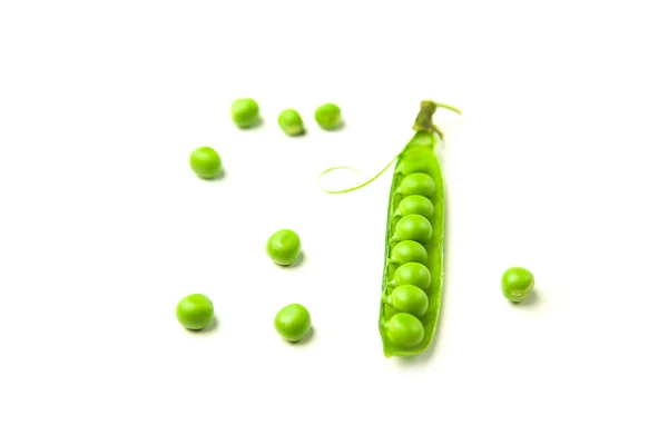 Pea pod och pea frön på vit — Stockfoto