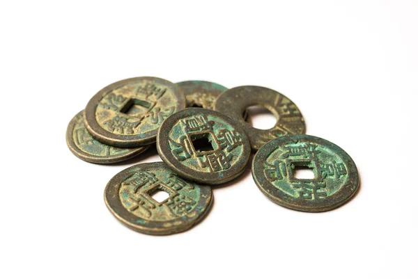 Ancient bronze coins of China on white — Stock Photo, Image