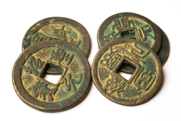 Ancient bronze coins of China on white — Stock Photo, Image