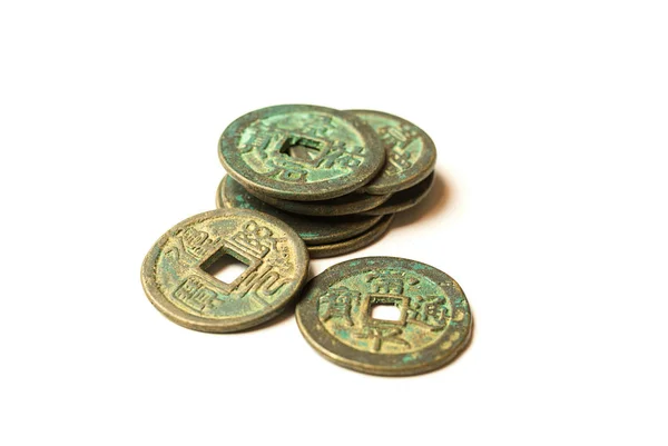 Ancient bronze coins of China on white — Stock Photo, Image