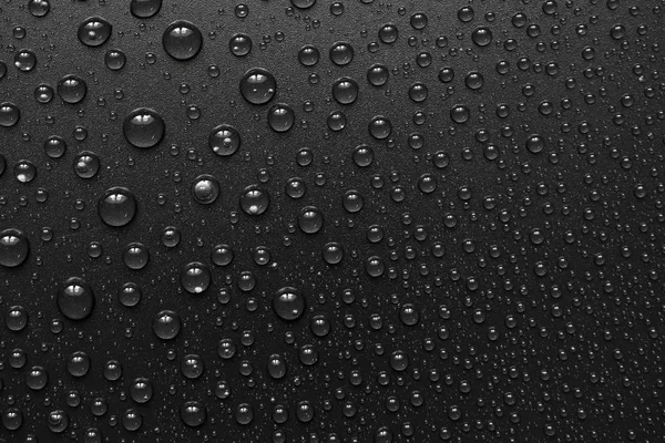 Gotas de água no fundo preto. Macro . — Fotografia de Stock