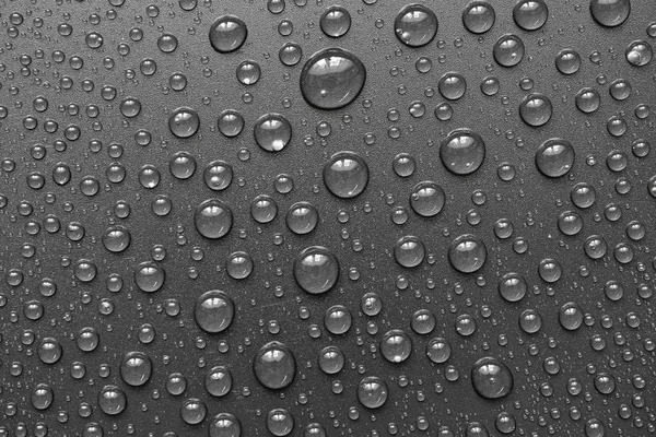 Gotas de água no fundo preto. Macro . — Fotografia de Stock