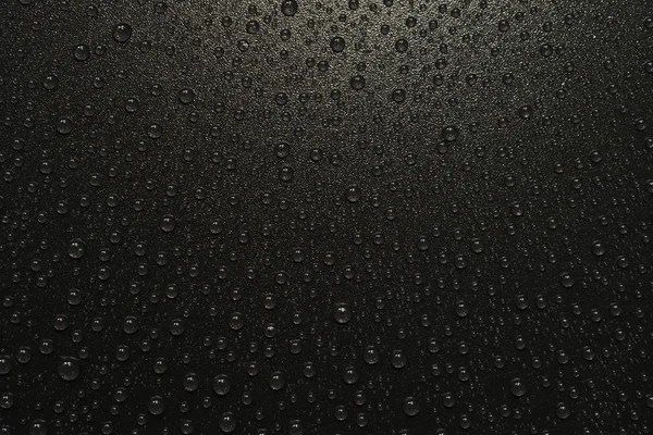 Gotas de água no fundo preto. Macro . — Fotografia de Stock