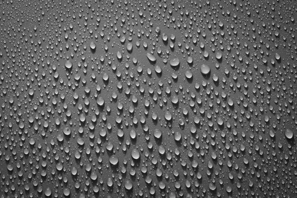 Gotas de água no fundo preto. Macro . — Fotografia de Stock