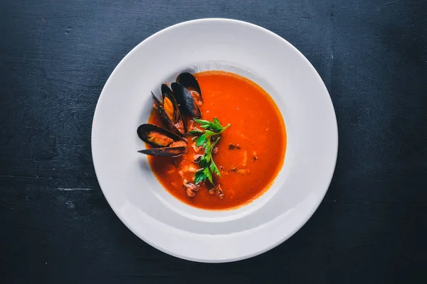 Tomato and seafood creamy soup — Stock Image Tomato and seafood creamy soup Royalty Free Stock Images