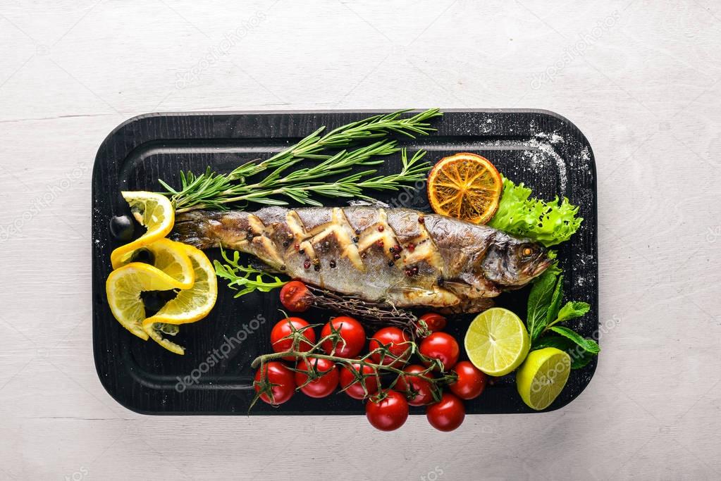 Trout fish baked with aromatic herbs