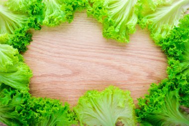 Marul. Çiğ sebze üst görünümü. Metniniz için boş alan.