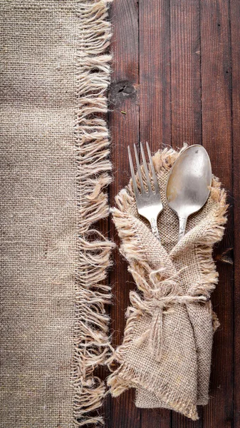 Old cutlery. On Wooden background. Top view.