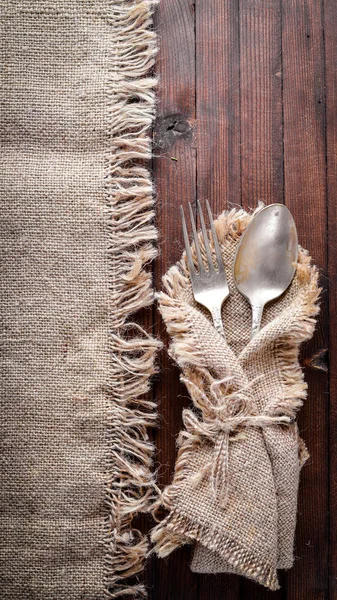 Old cutlery. On Wooden background. Top view.