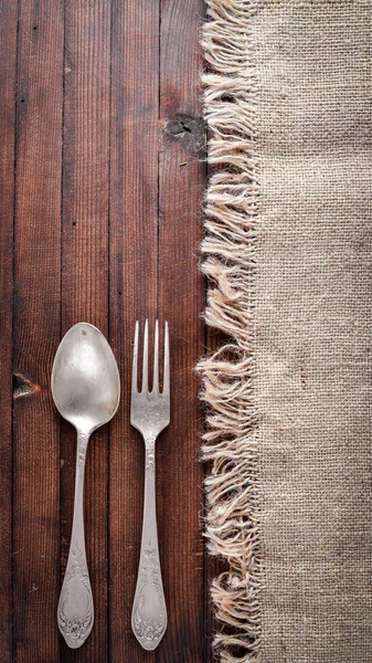 Old cutlery. On Wooden background. Top view. — Stock Photo, Image