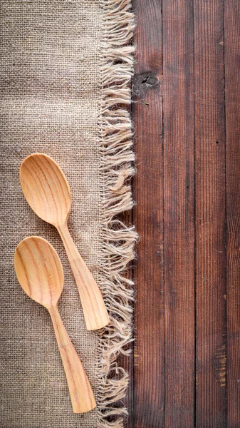 Wooden spoon. On Wooden background. Top view. — Stock Photo, Image