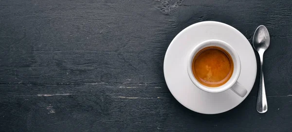 Káva Espresso na dřevěném pozadí. Horní pohled. Volné místo pro text. — Stock fotografie