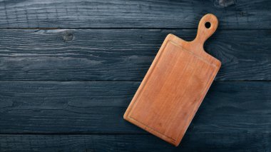 Mutfak ahşap tahta. Ahşap bir arka plan üzerinde. Üstten Görünüm. Metniniz için boş alan.