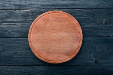 Mutfak ahşap tahta. Ahşap bir arka plan üzerinde. Üstten Görünüm. Metniniz için boş alan.