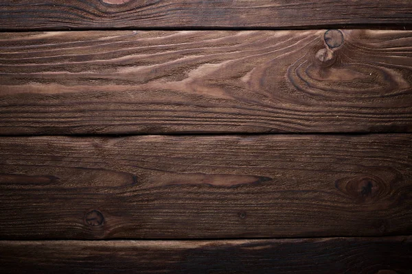 Fondo in legno marrone. Vista dall'alto. Spazio libero per il testo . — Foto Stock