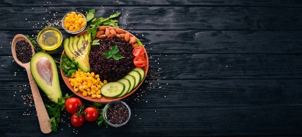 Black Rice Avocado Cucumber Corn Almonds Wooden Background Top View — Stock Photo, Image