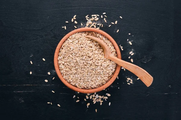 Oatmeal Flakes Plate Wooden Background Top View Copy Space — Stock Photo, Image