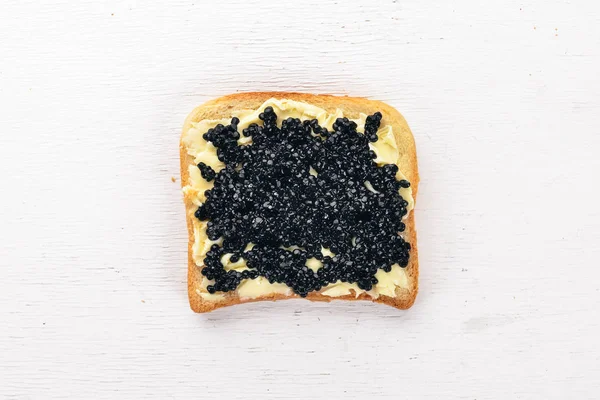 Sandwich Caviar Negru Unt Fundal Din Lemn Privire Sus Spațiu — Fotografie, imagine de stoc