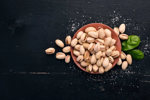 Nueces Pistacho Sobre Fondo Madera Oscura Snacks Saludables Vista Superior — Foto de Stock