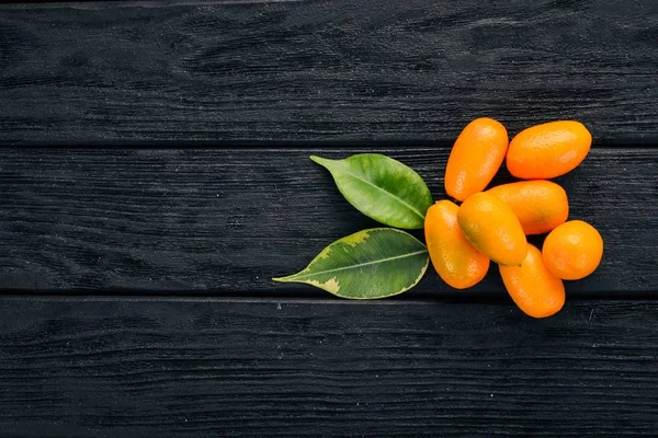 Kumquat Frutas Tropicais Cítricas Fundo Madeira Vista Superior Espaço Cópia — Fotografia de Stock