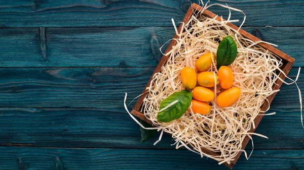 Kumquat Frutas Tropicales Cítricas Sobre Fondo Madera Vista Superior Copiar —  Fotos de Stock