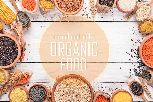 Cereal and millet. Organic food. Buckwheat, lentils, rice, millet, barley, corn, black rice. Top view. — Stock Image Cereal Millet Organic Food Buckwheat Lentils Rice Millet Barley Corn Stock Photo