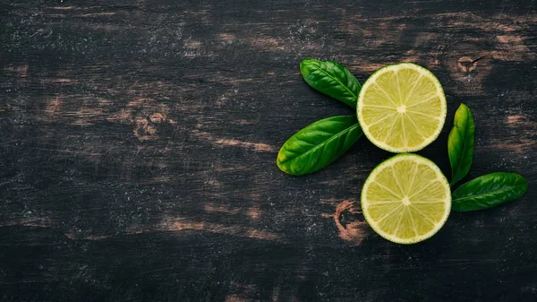 Fresh Green Lime Fruits Wooden Background Top View Copy Space — Stock Photo, Image