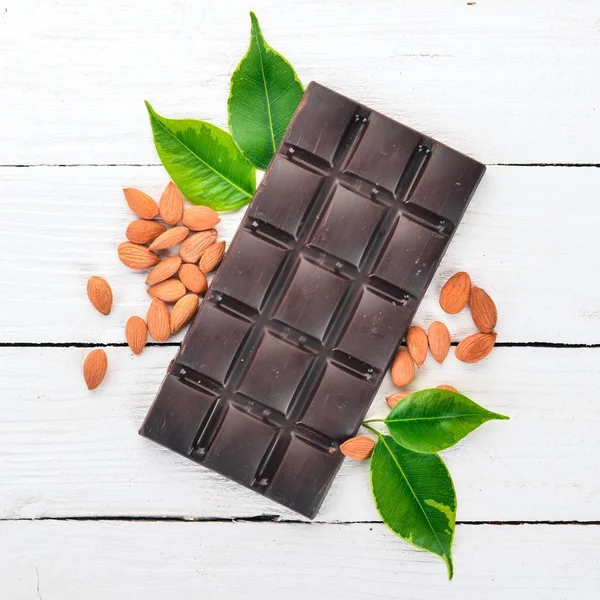 Dark Chocolate Almond Nuts Wooden Background Top View Copy Space — Stock Photo, Image