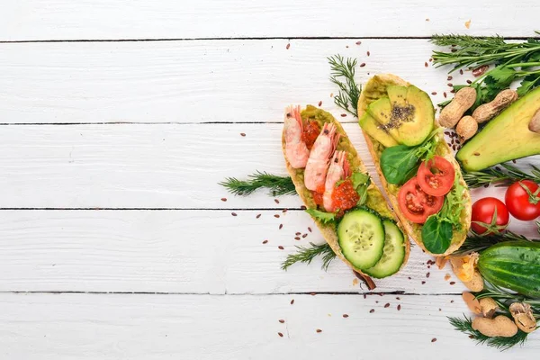 Burger Sandwich Shrimp Avocado Caviar Cucumber Wooden Background Top View — Stock Photo, Image