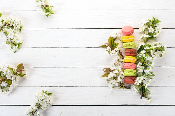 Macaroons colorful. Cake. Top view On a wooden background, Copy space.