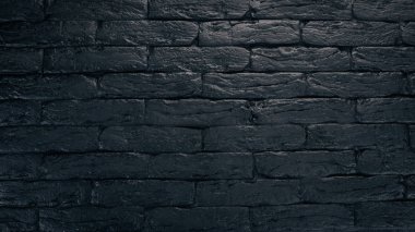 Siyah tuğla arka plan. Üstten Görünüm. Kopya alanı.