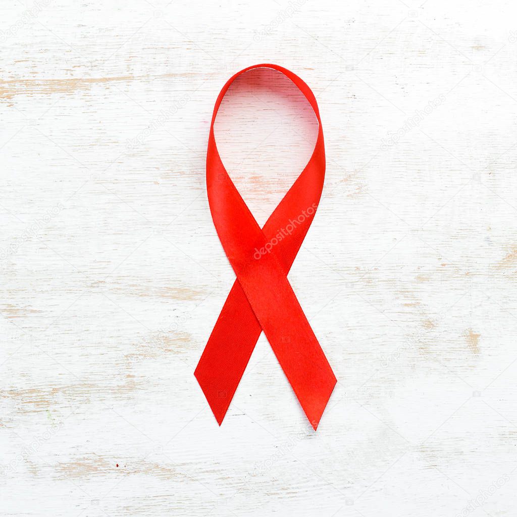 Red Ribbon. World Aids Day concept. Top view. Free copy space.