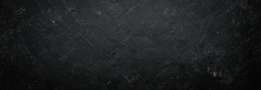 Siyah taş arka plan. Üst görünüm. Ücretsiz kopya alanı.