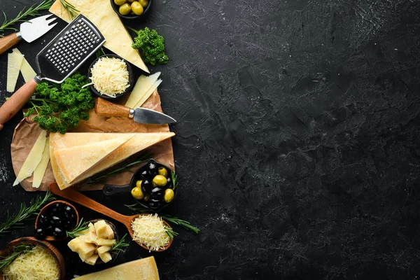 Hard Cheese Olives Cheese Knife Black Stone Background Parmesan Top — Stock Photo, Image