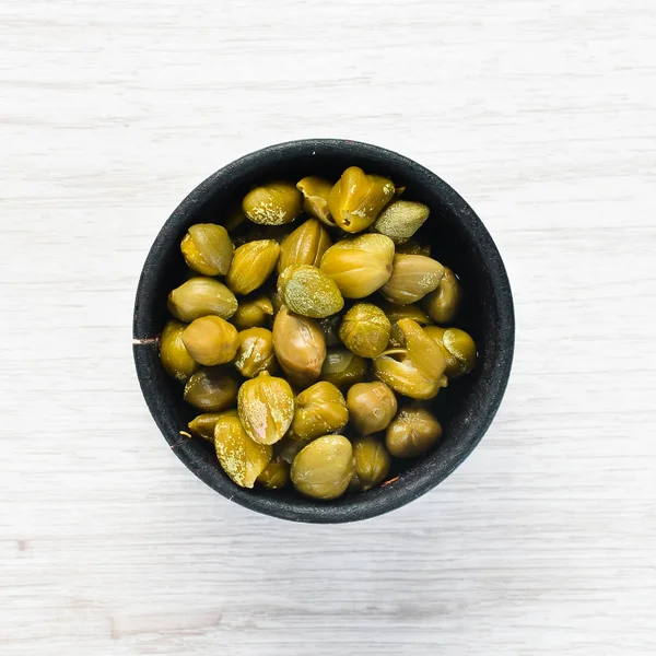 Marinated Capers Bowl White Wooden Background Top View Free Space — ストック写真